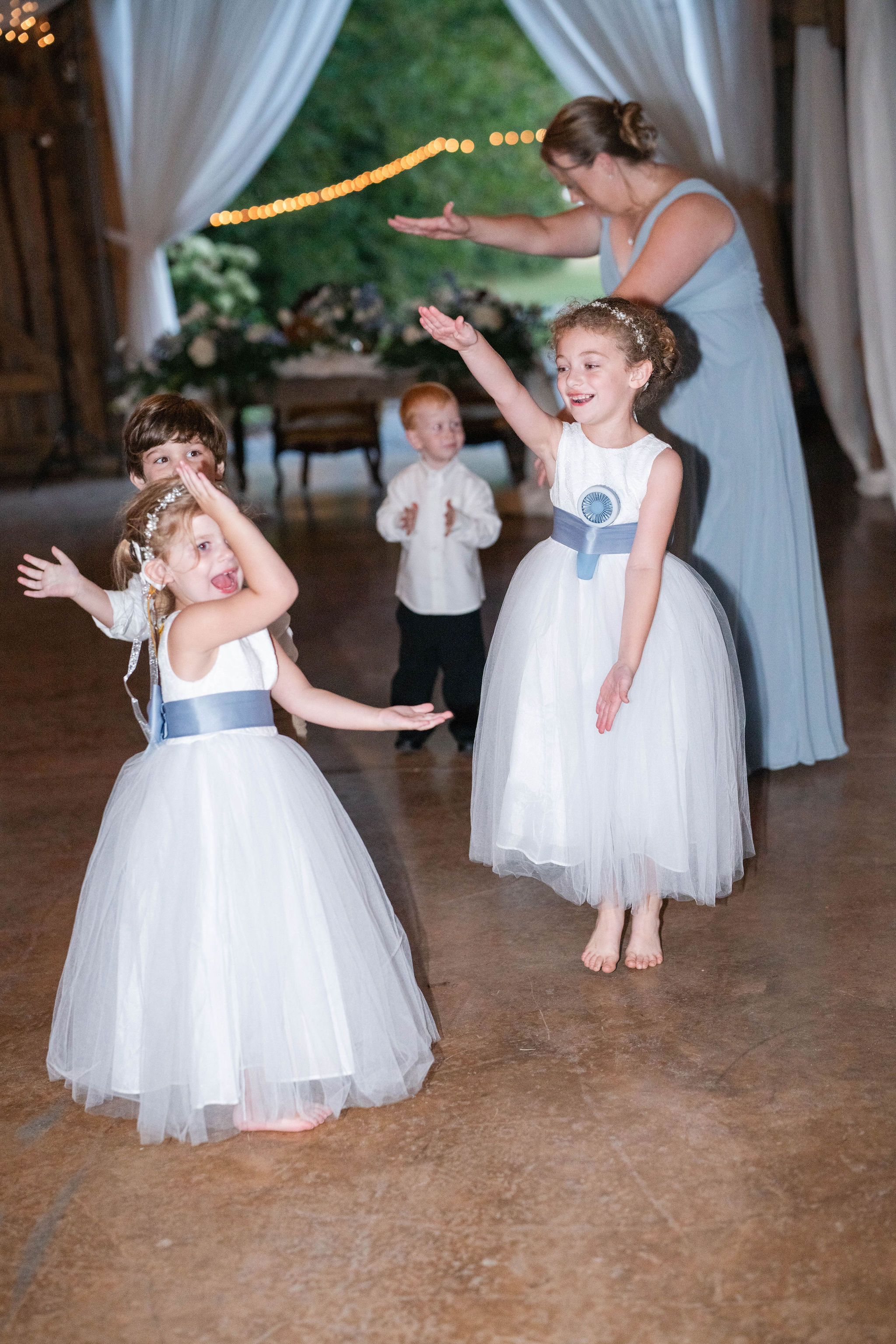 The kiddos enjoying "Baby Shark" on the dance floor at south central KY wedding venue, near Green River Lake.
