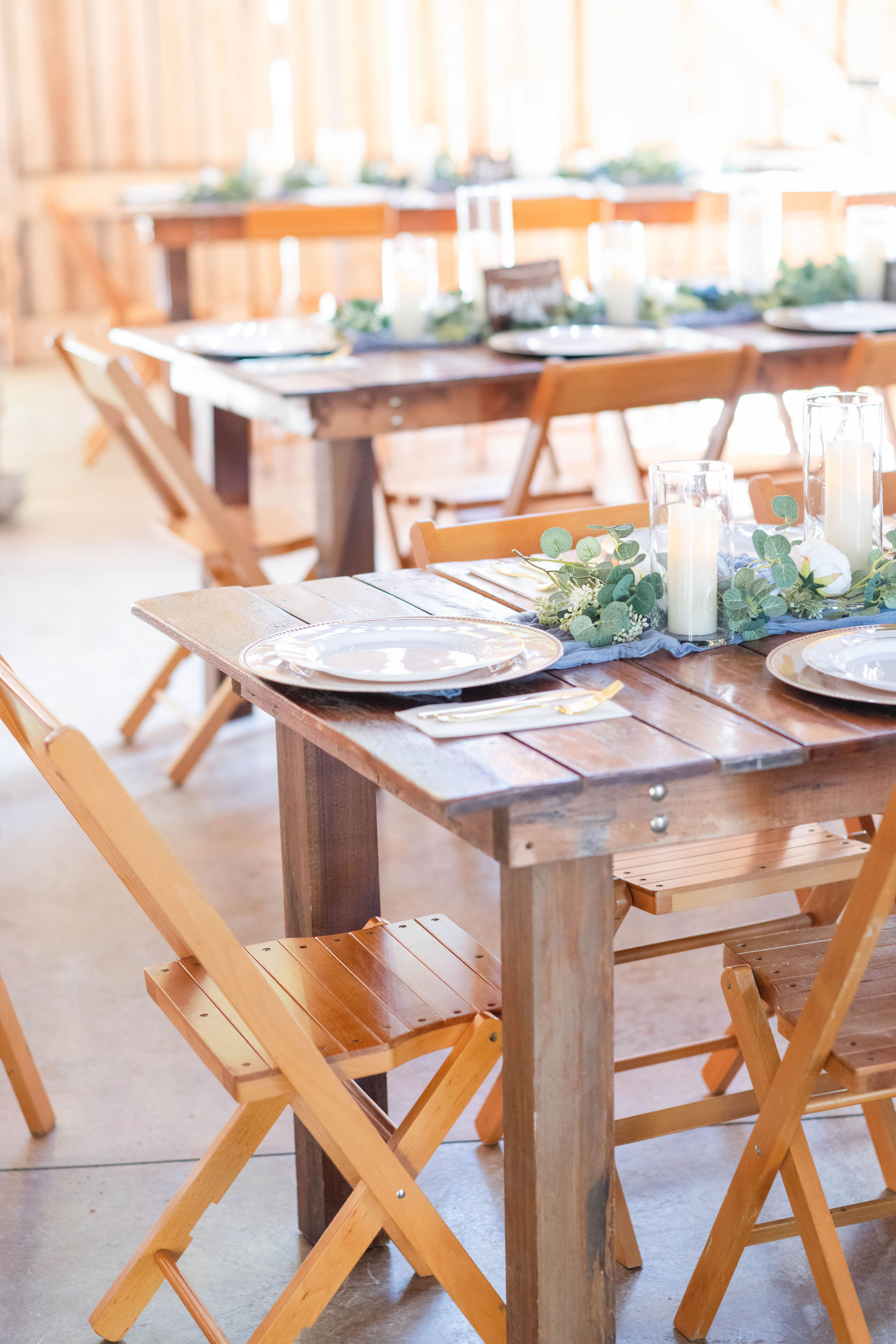 Reception tables decorated to Hannah & Michael's vision at The Barn at Cedar Grove 
