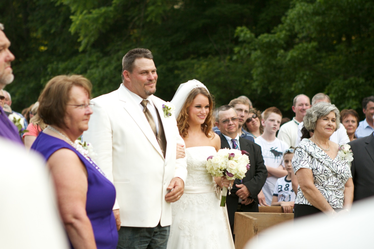 Bride and her father walking down the aisle
