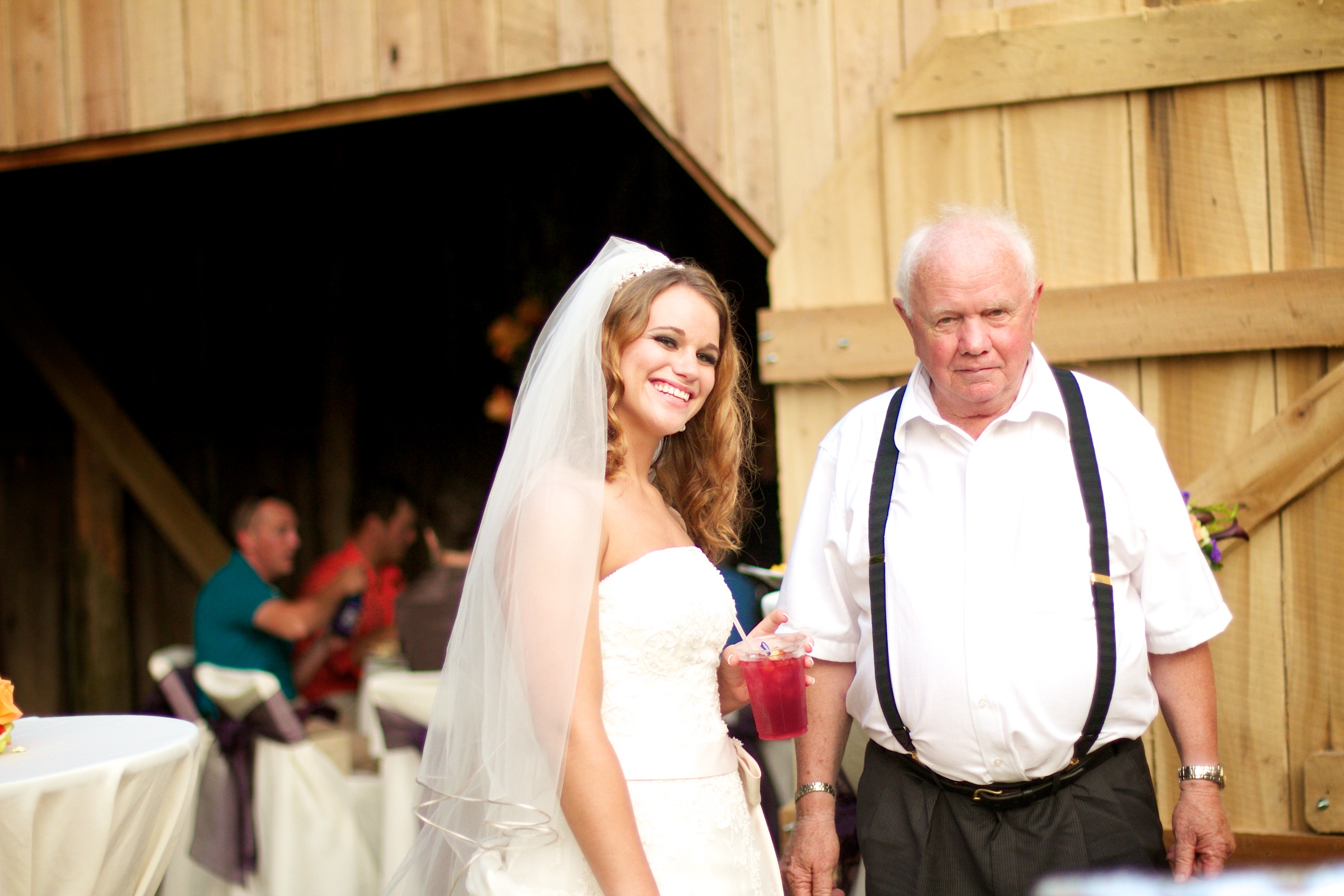 bride poses with her grandfather