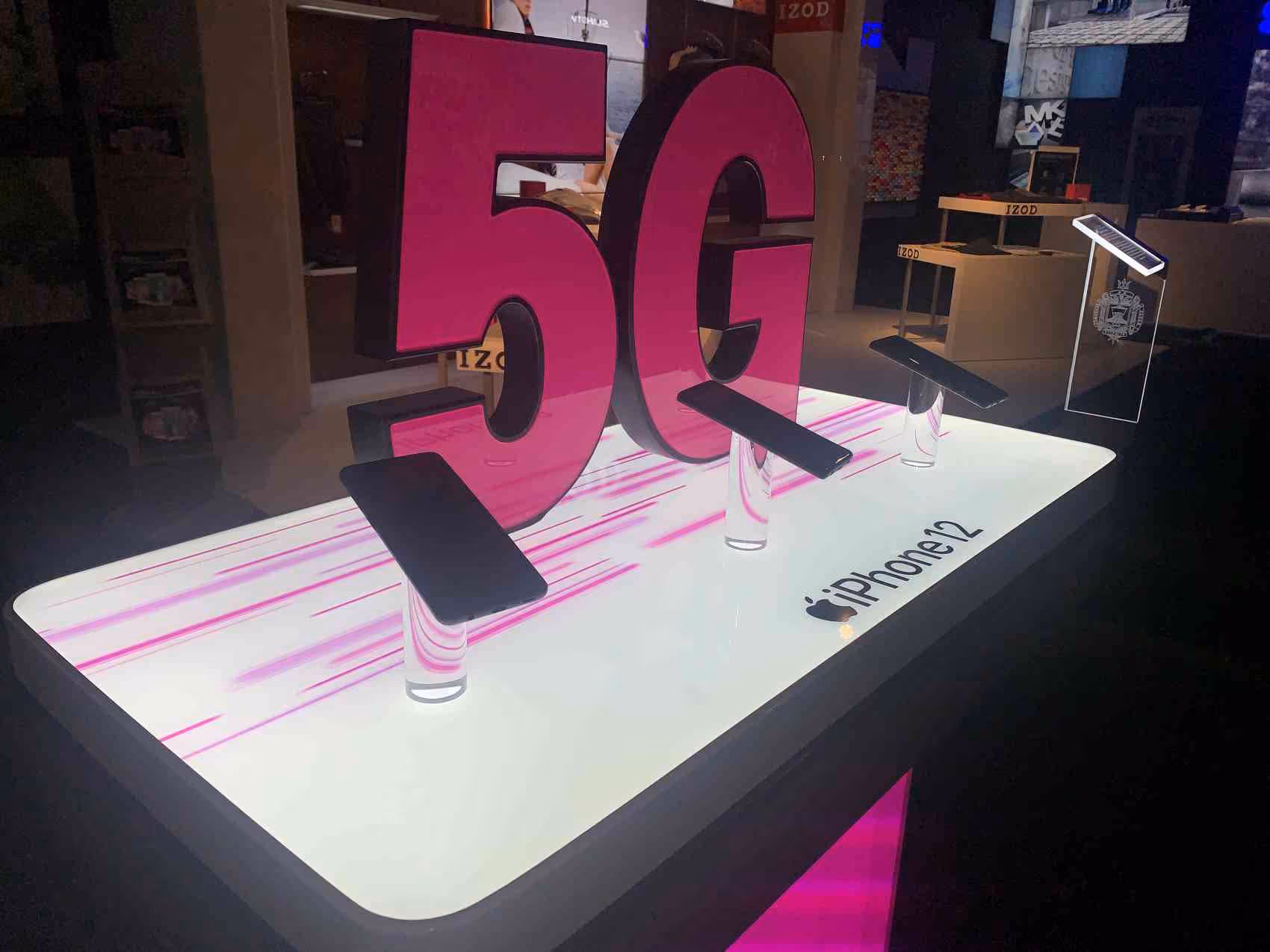 iPhone product display with illuminated 5G dimensional letters