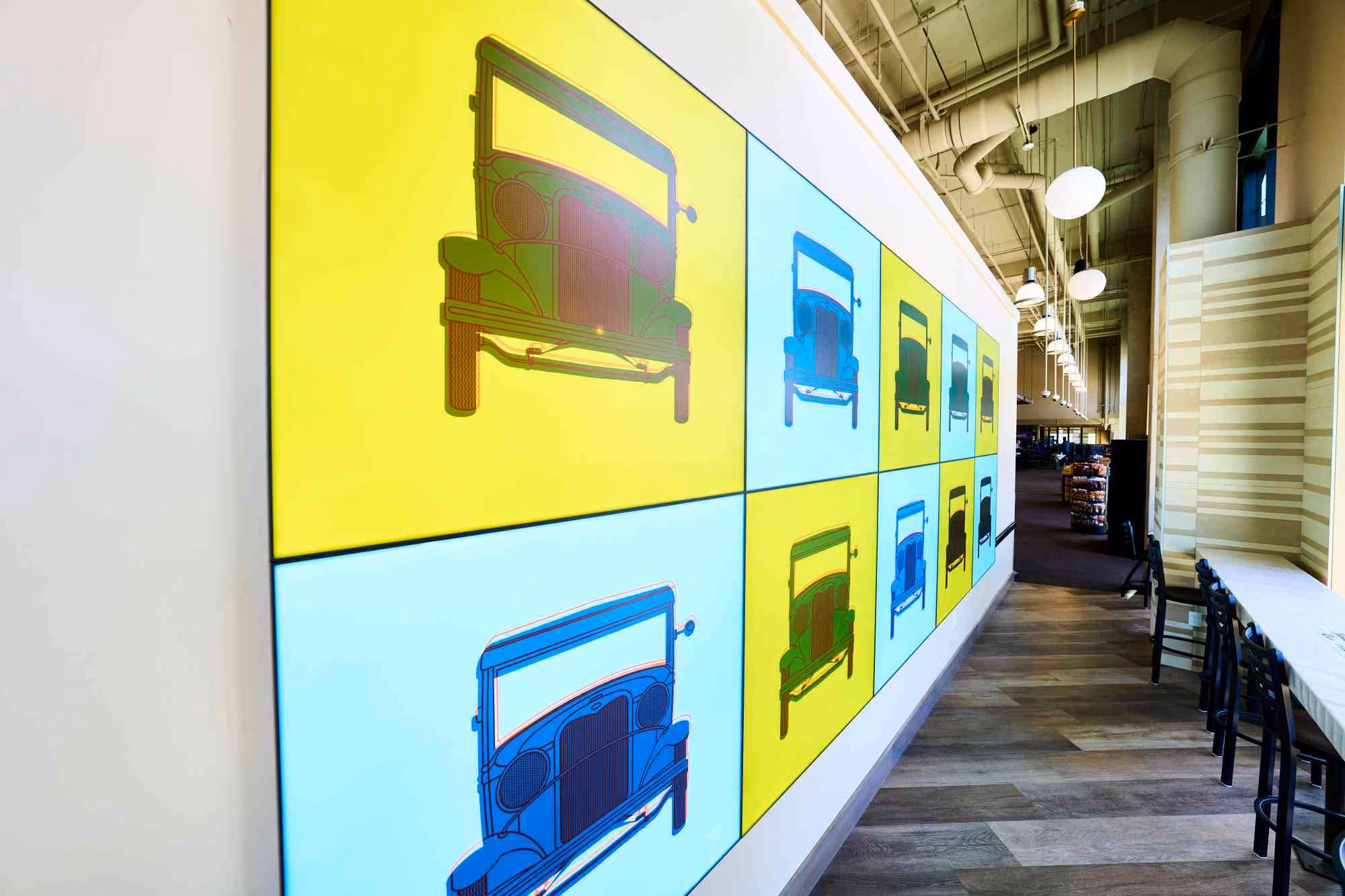 Custom wall panels with Model T art; LED panels with recycled acrylic