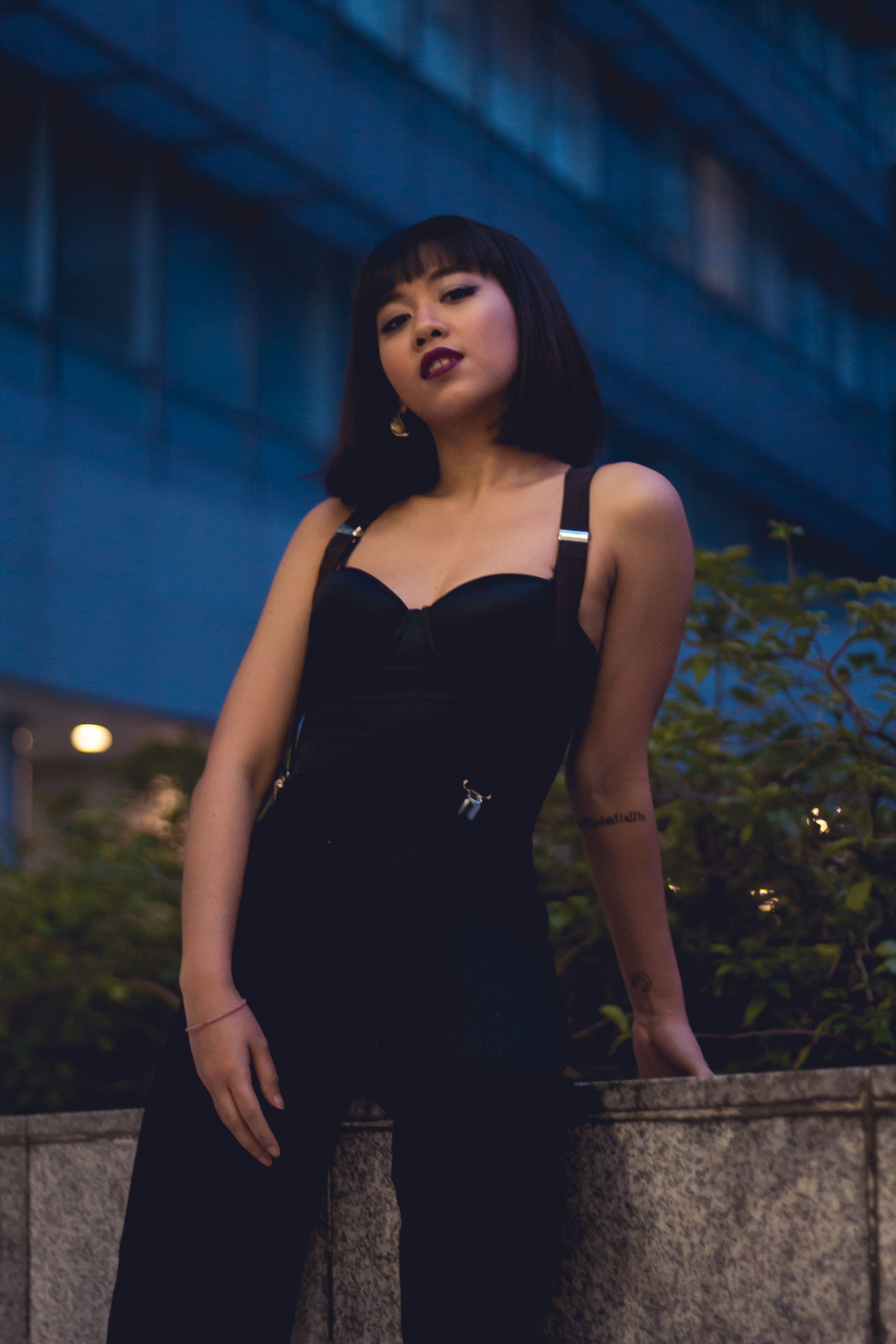 Portrait of a girl with a bob cut wearing all black