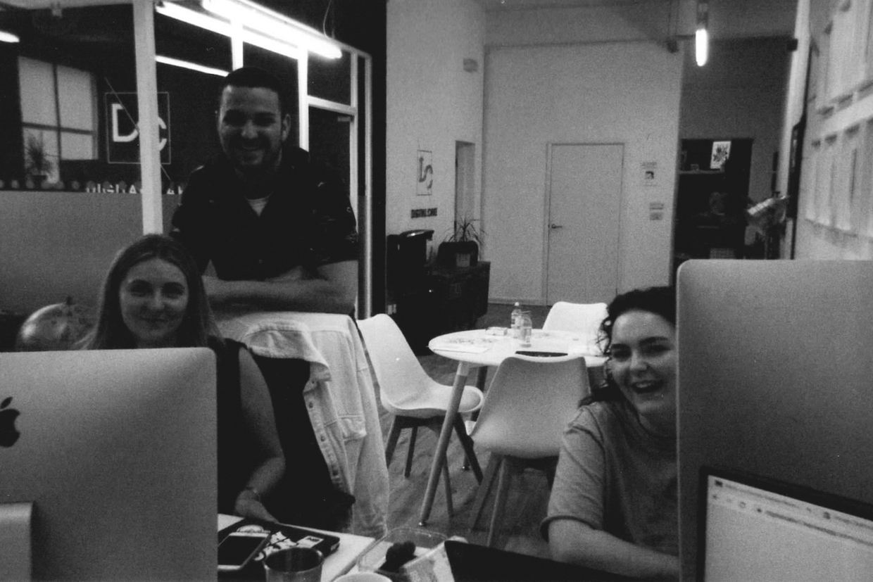 Group team photo at desks