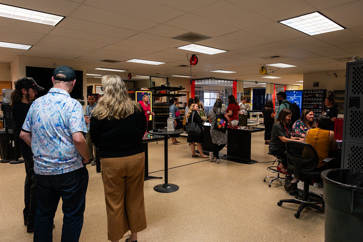 Guests visiting the Ideum workshop, where our touch tables and displays are built.