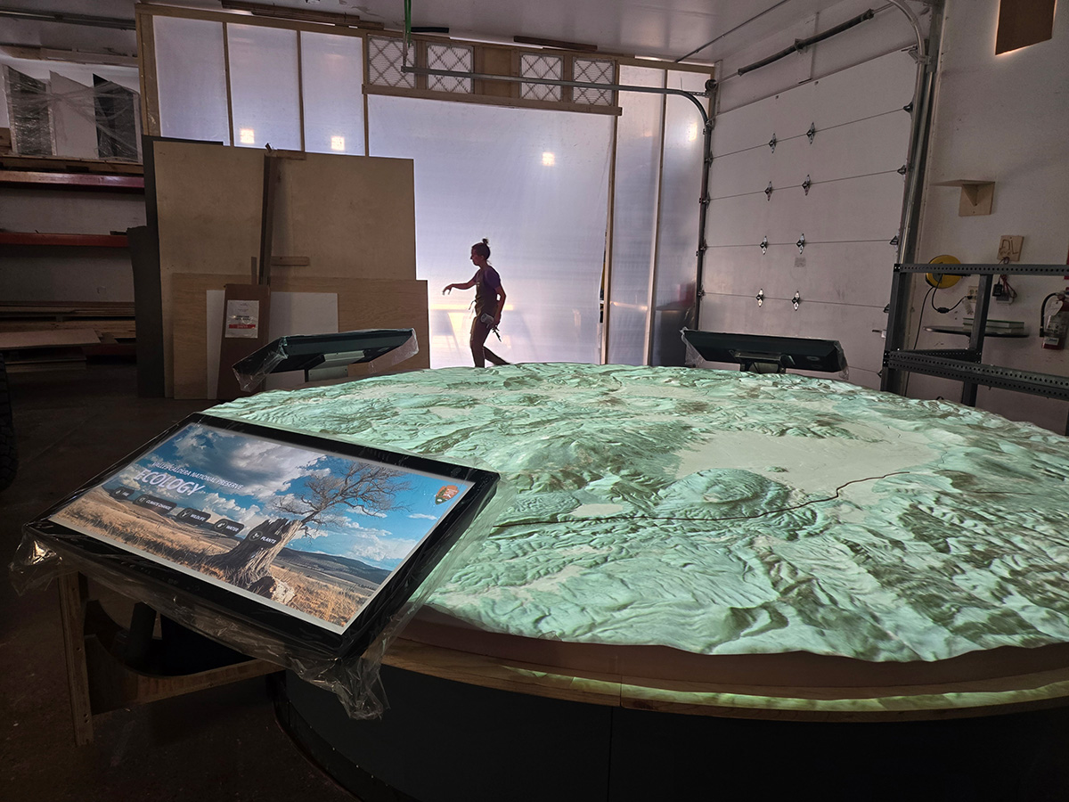 The Valles Caldera map with projection in the Ideum fabrication studio.
