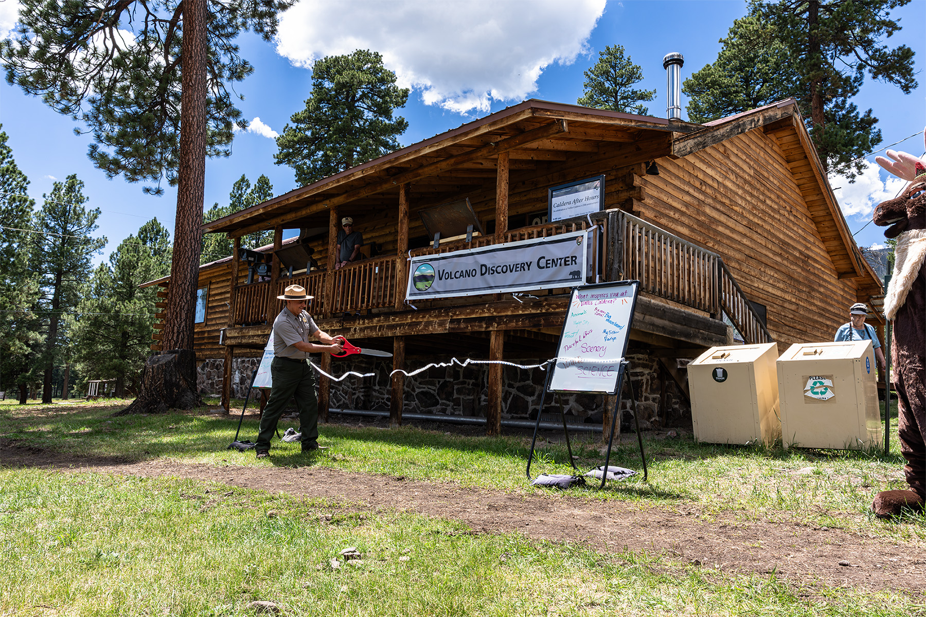 Valles Caldera Superintendent Jorge Silva-Bañuelos cuts the ribbon to officially open the Volcano Discovery Center.