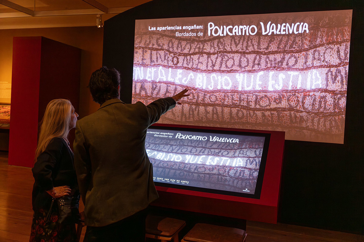 A 65" Inline display integrated into a custom kiosk at the Museum of International Folk Art in Santa Fe, New Mexico.