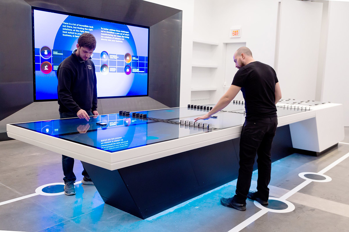 An Ideum-built custom six screen touch table with object recognition.