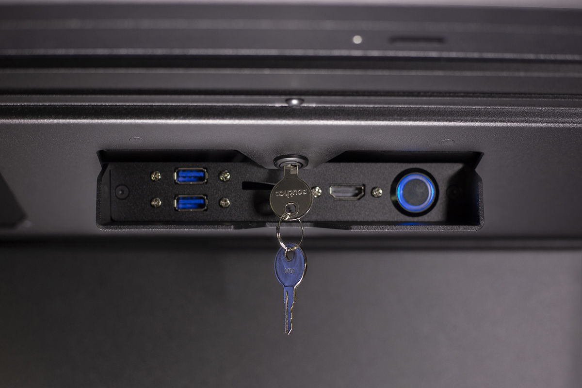 The locking I/O box on a Platform II, featuring the single push button that powers on the PC and display simultaneously.