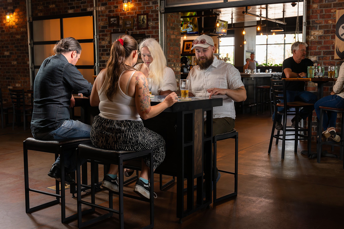 The final design for Ideum’s Tasting Table. It is constructed of a welded steel base structure that supports a ventilated plywood enclosure for electronics. 