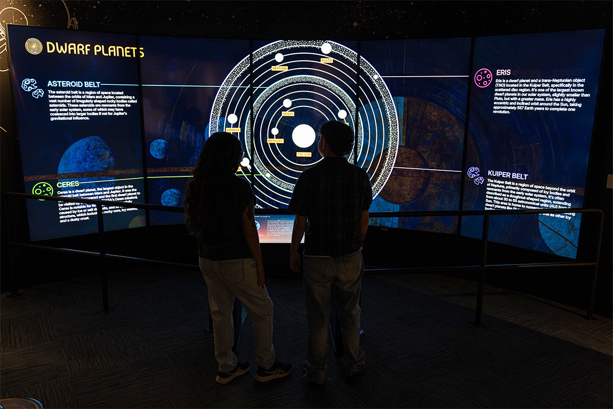Guests end their journey exploring dwarf planets and the Kuiper belt.