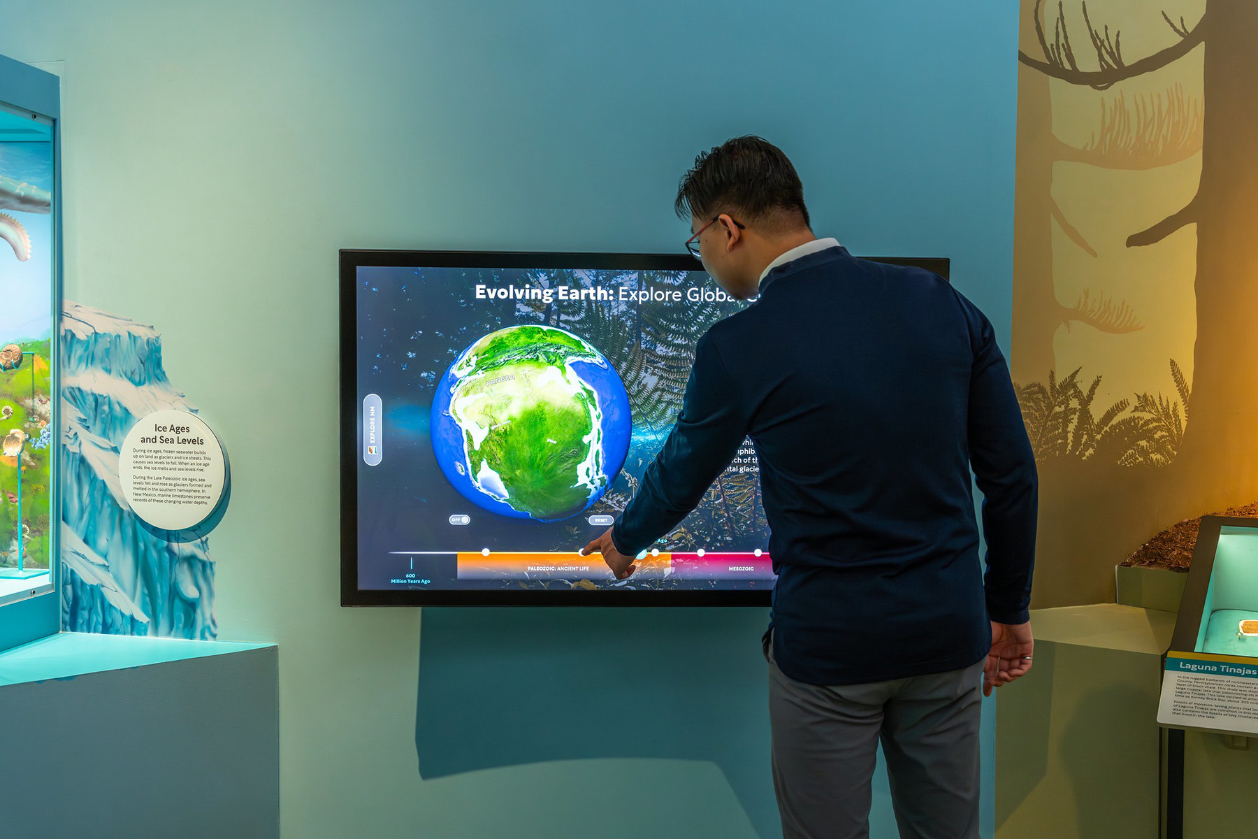 Exploring Earth is on a wall-mounted 55” Ideum Presenter, allowing it to be viewed by multiple people simultaneously