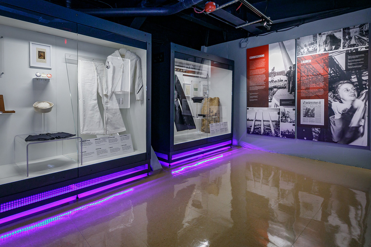 Custom-fabricated cabinets were designed to fit within the ship's bulkheads. 