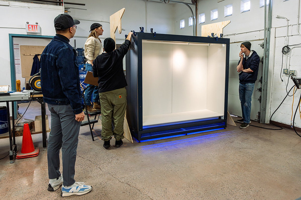 The Ideum team with the first assembled cabinet in the Ideum fabrication studio. 
