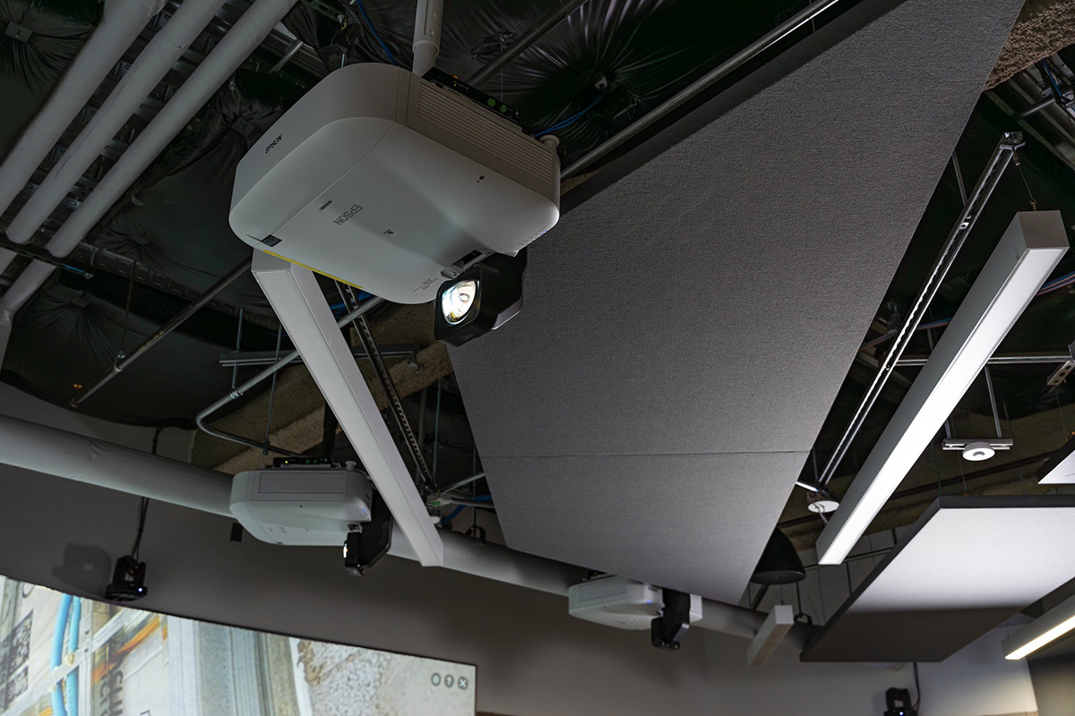 Three ultra-short-throw projectors are used to create the giant ultrawide projection space.