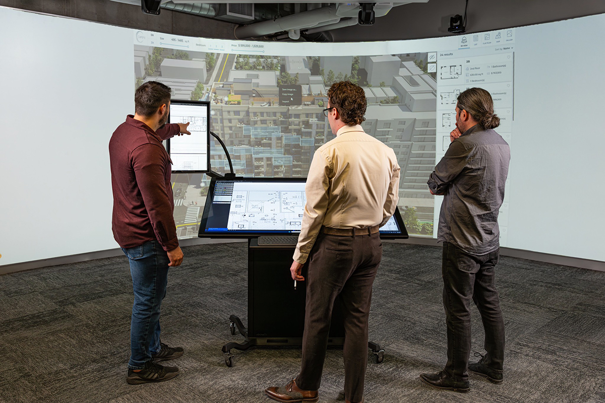 The curved projection screen allows for fully immersive project visualization, and can be used with or without the Drafting II touch table.