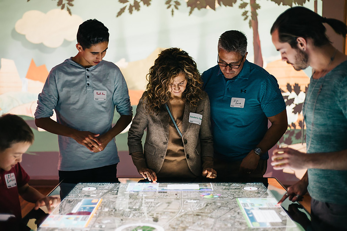Players fly over a map of Albuquerque to reach the target zone.