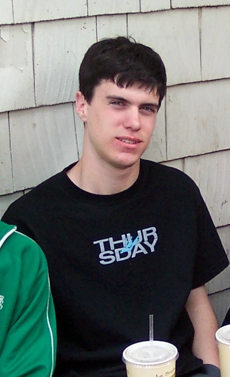 Mark as a teenager wearing a Thursday band shirt.