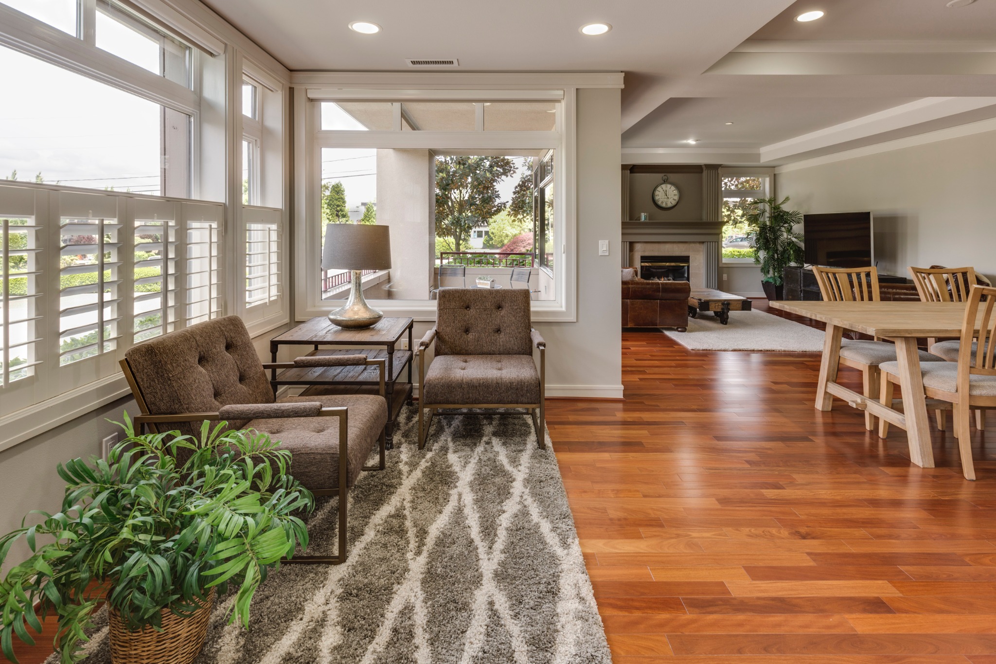 Bright furnished sitting area with adjoining dining and living spaces