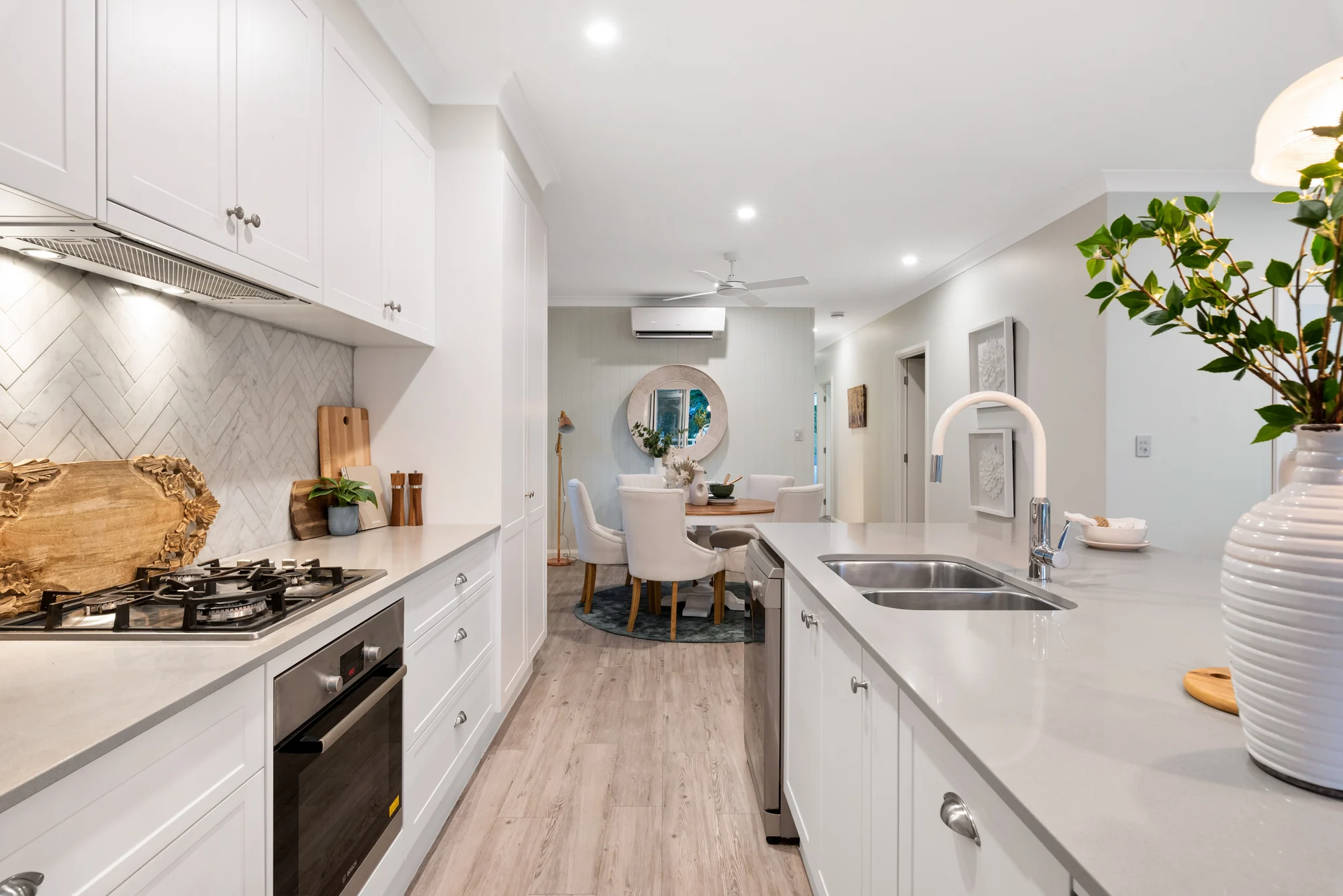Interiors · White kitchen and island