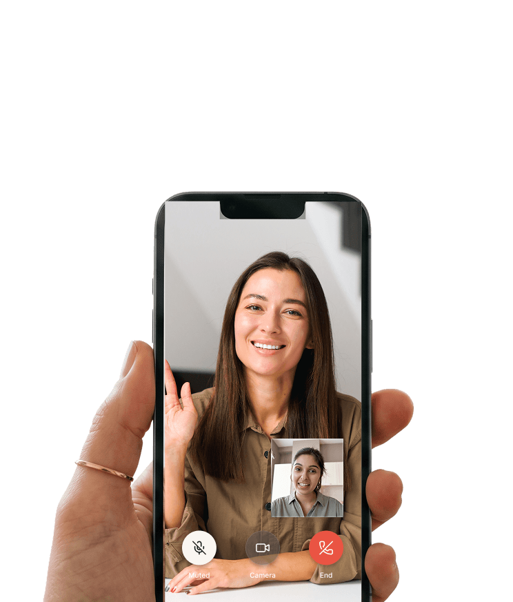 mobile phone with two people in a video call