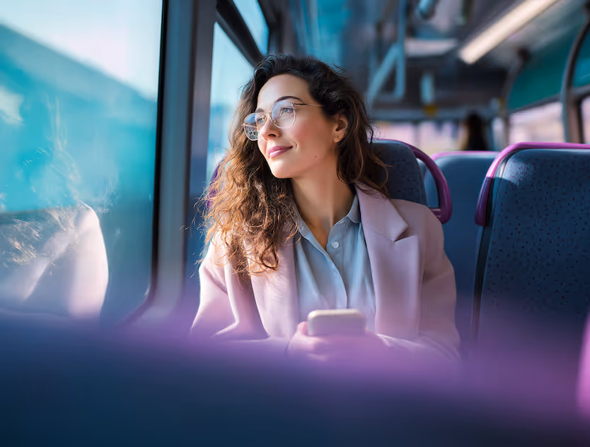 commuter relaxing aboard her shuttle