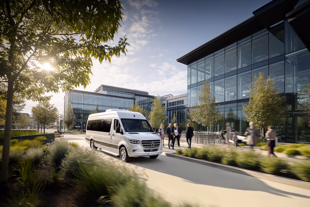shuttle offloading office worker at corporate headquarters