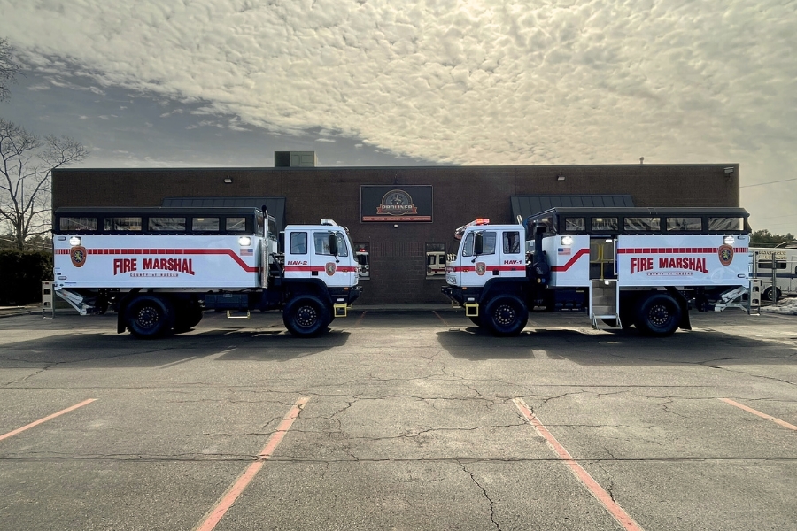 Two Acela Monterra High-Water/Flood Rescue trucks for Nassau County Fire Marshal staged in front of Proliner Rescue, Acela’s exclusive New York dealer