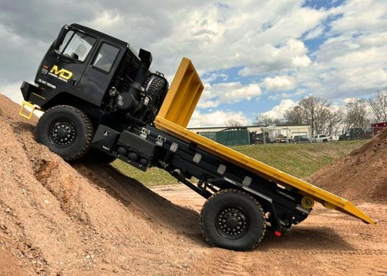 Acela Monterra 4x4 with flatbed hooklift body for versatile load handling and modular transport applications