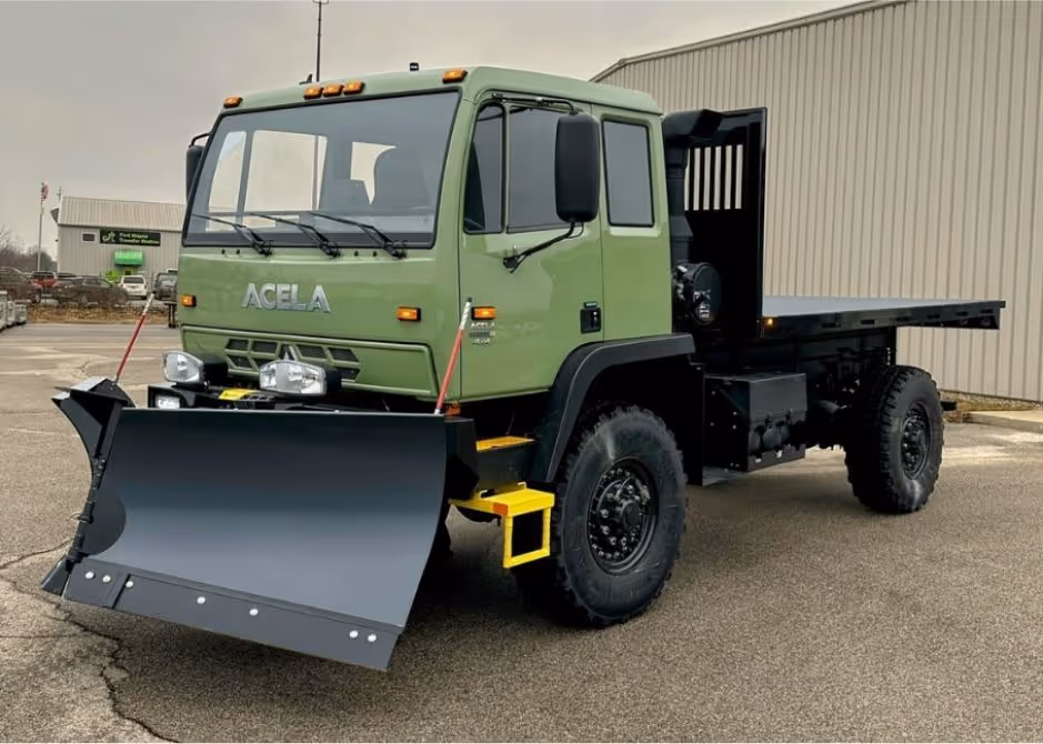 Acela Monterra 4x4 equipped with flatbed and front-mounted plow for versatile utility and snow removal tasks