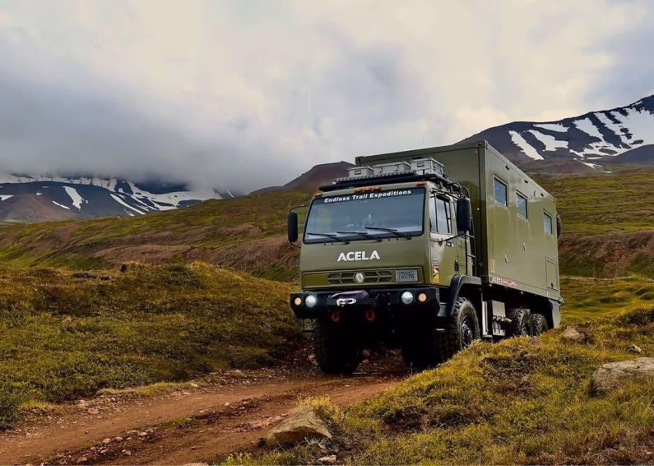 BAT, the Acela Monterra 6x6, coming over a hill in the Icelandic mountains during an overland expedition