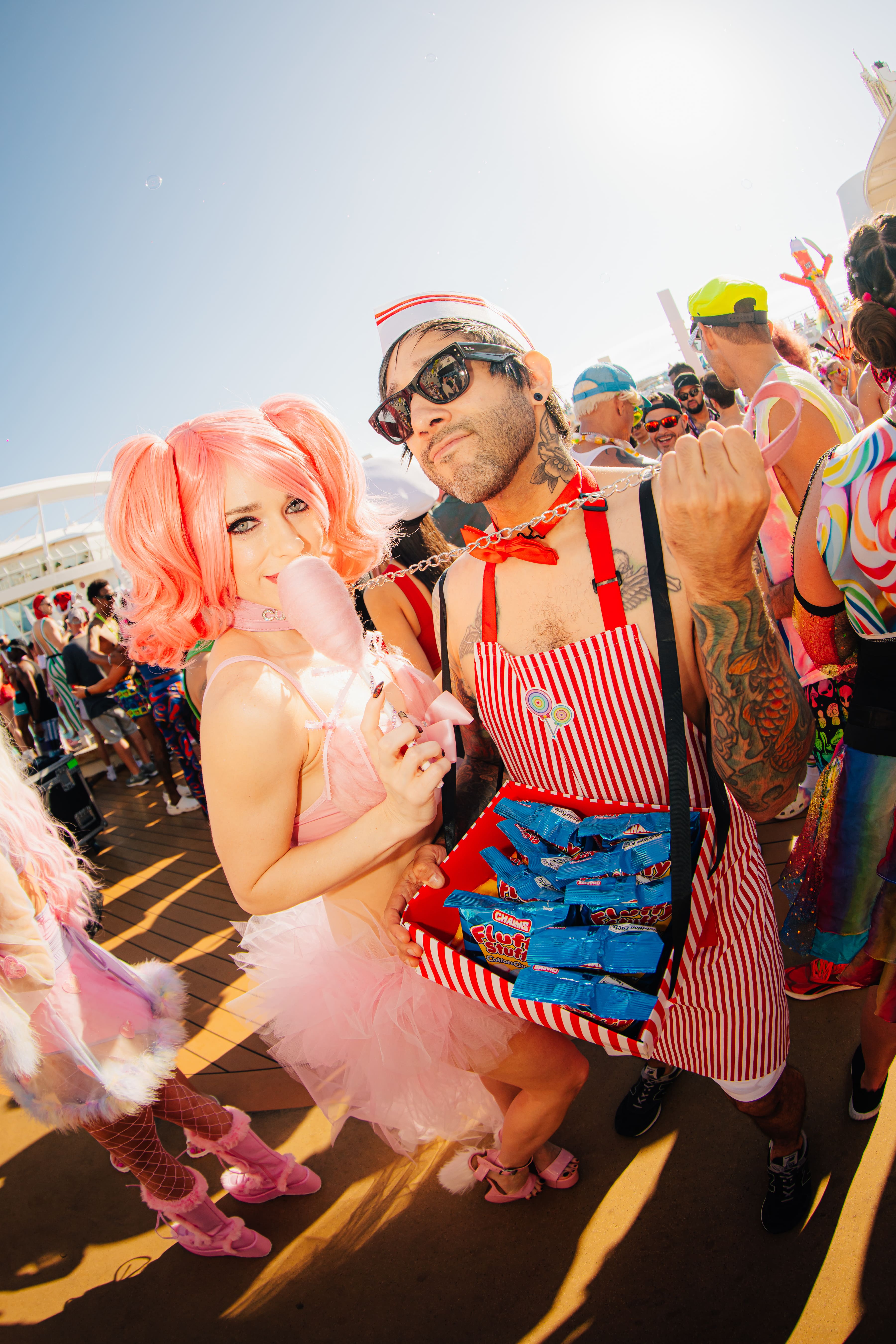 Man and woman wearing rave costumes on the ship deck during Groove Cruise Miami