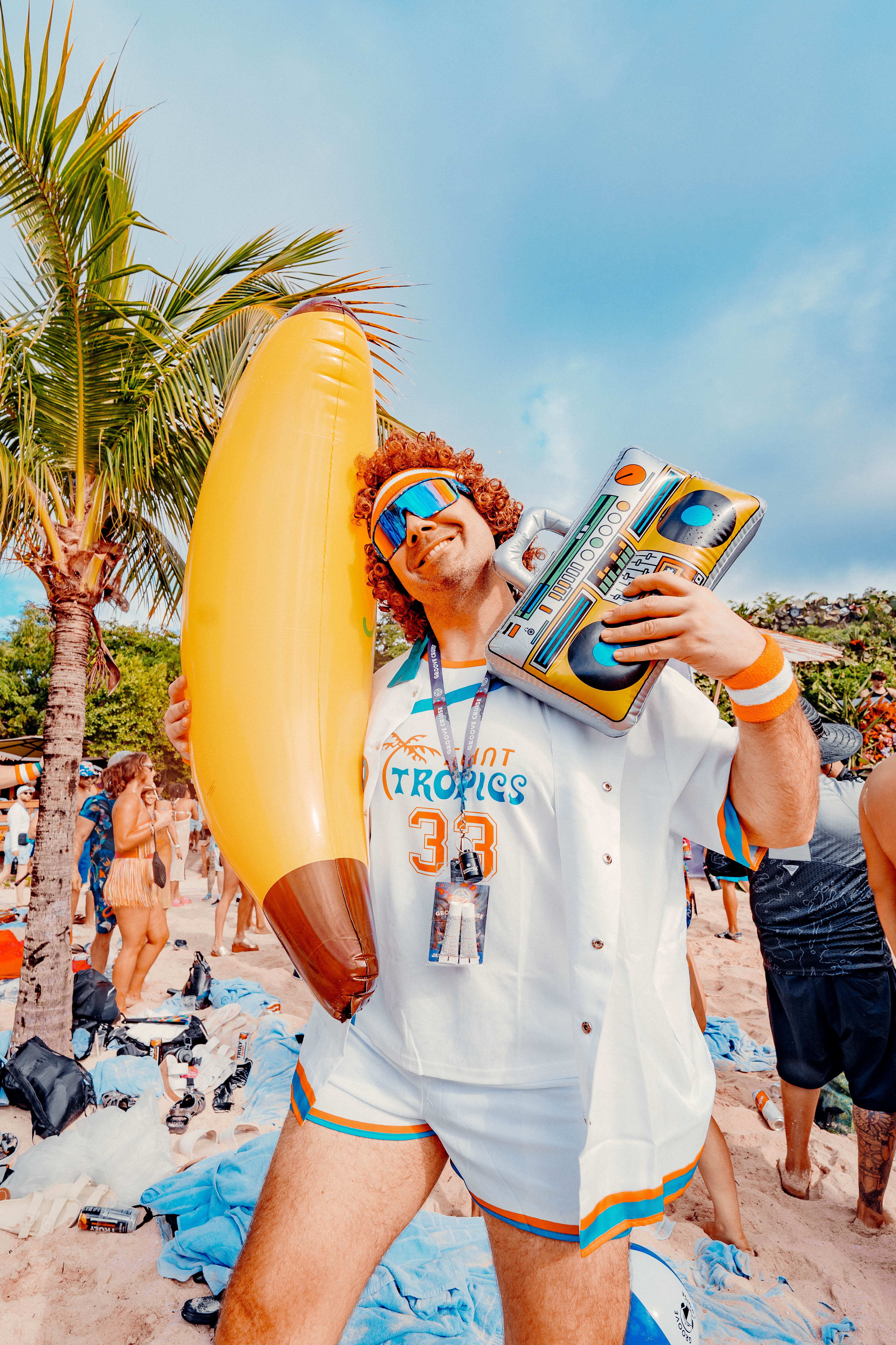 Festival-goer in costume for Groove Cruise beach party theme day