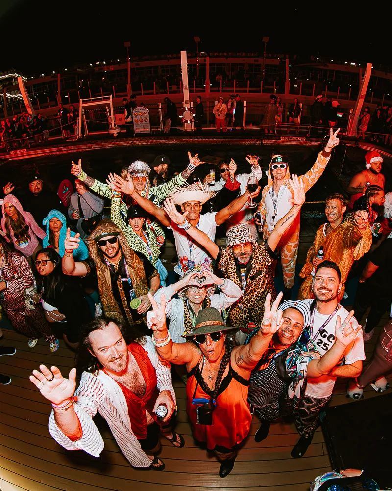 Festival cruise audience immersed in music, creating lasting memories