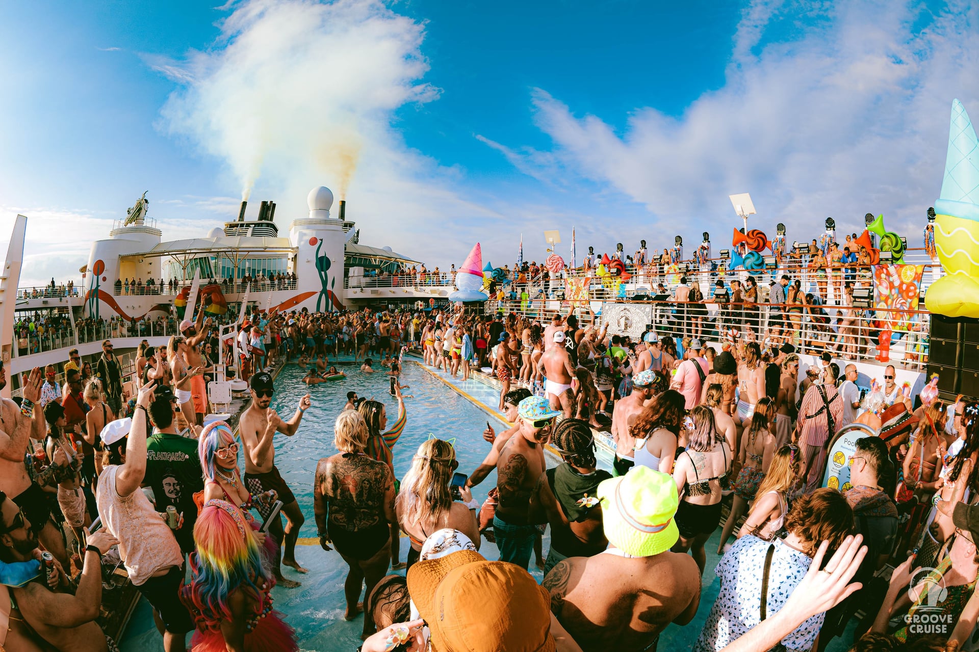 Groove Cruise 2026 attendees dancing on ship deck during DJ set