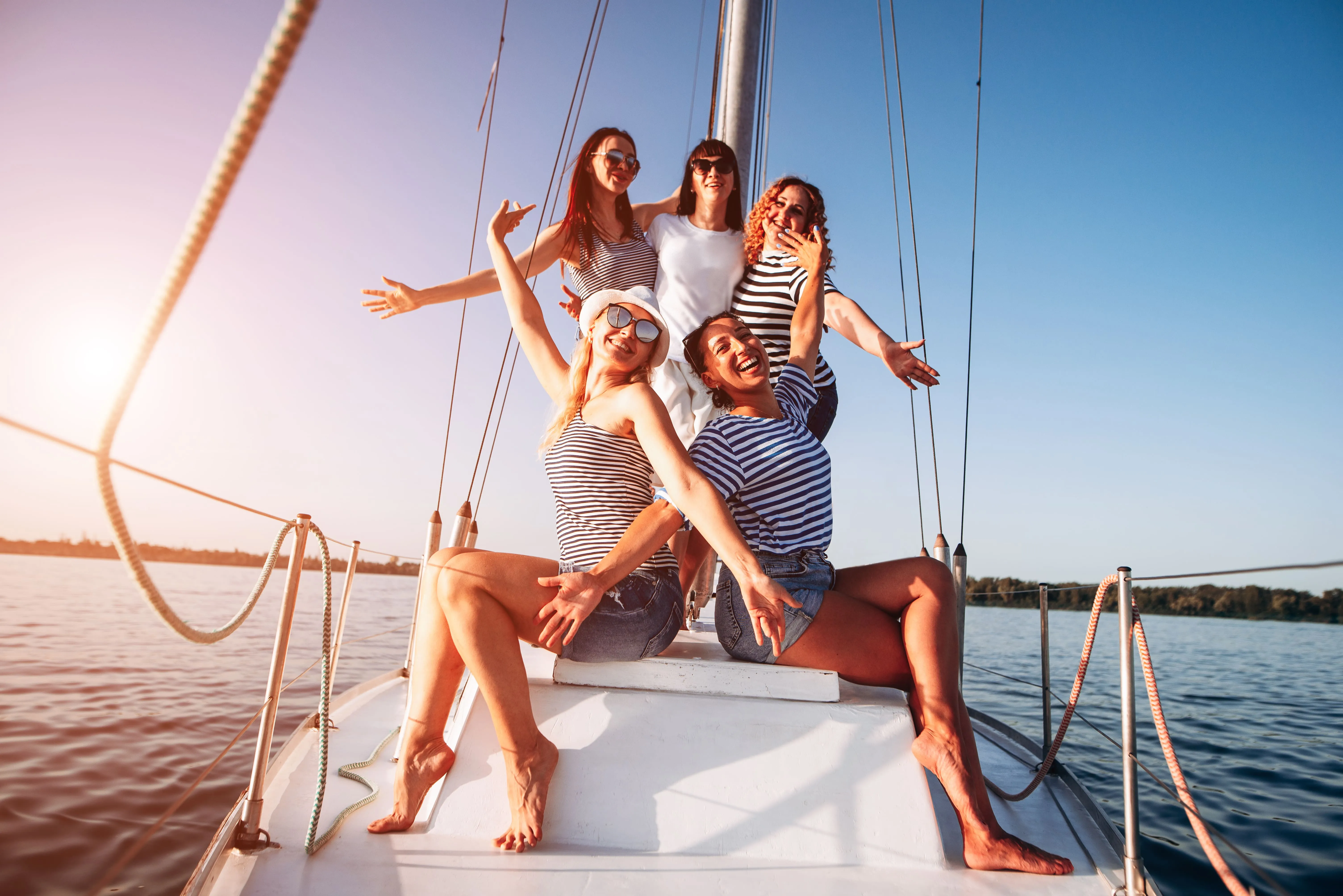 Bachelorette party group sailing on a yacht along the Miami coast