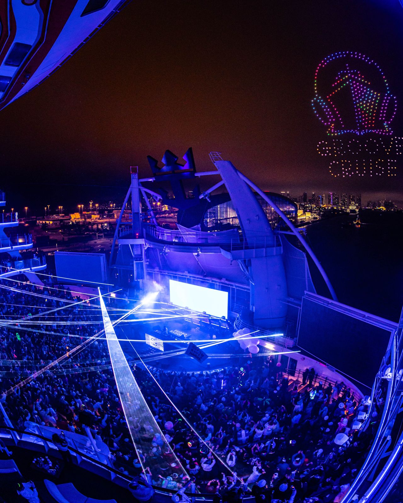 Crowd dancing under lights on Groove Cruise 2025 EDM festival cruise