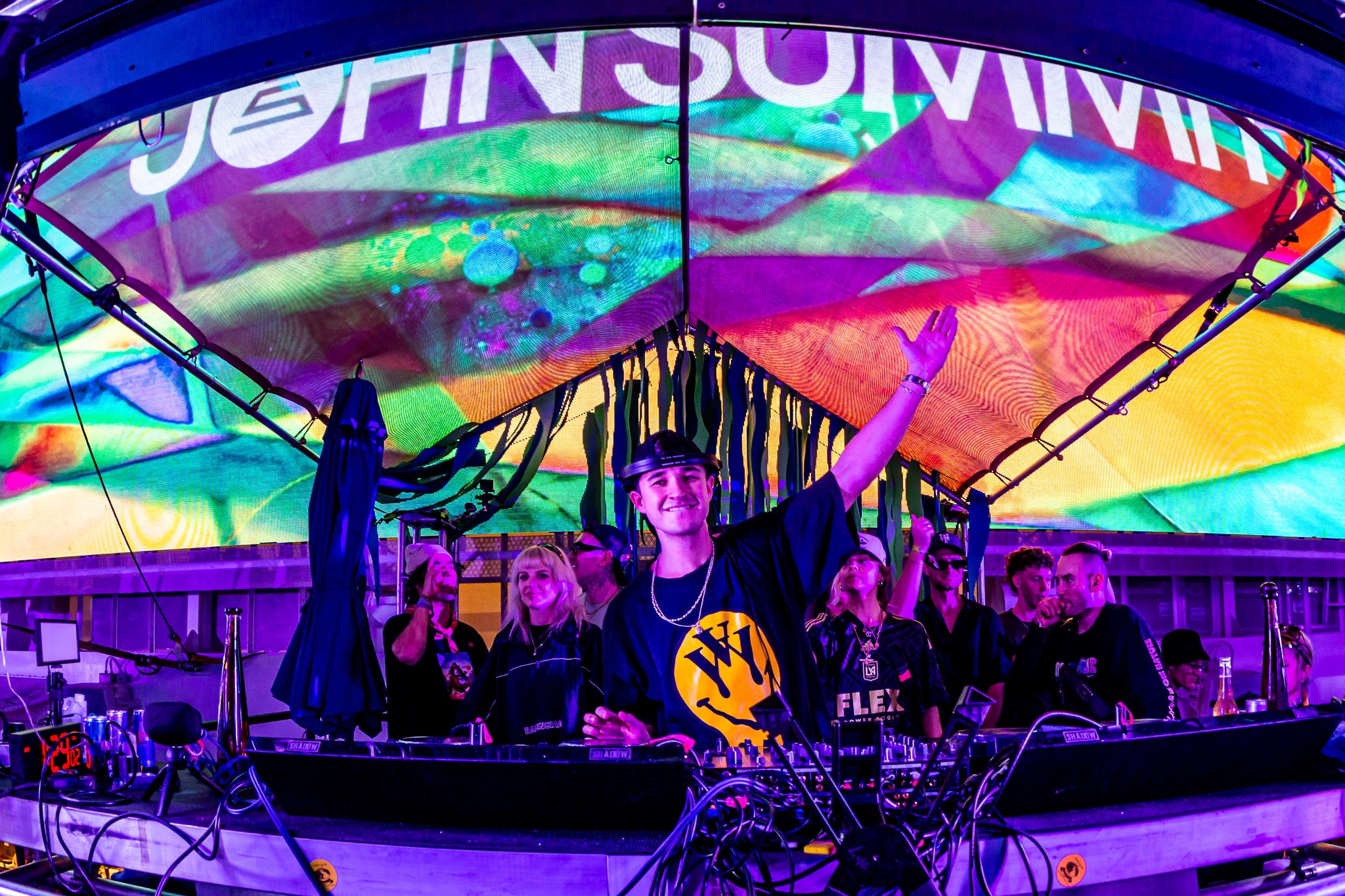 John Summit performing a high-energy house music set on the Pool Deck of Groove Cruise Miami 2024