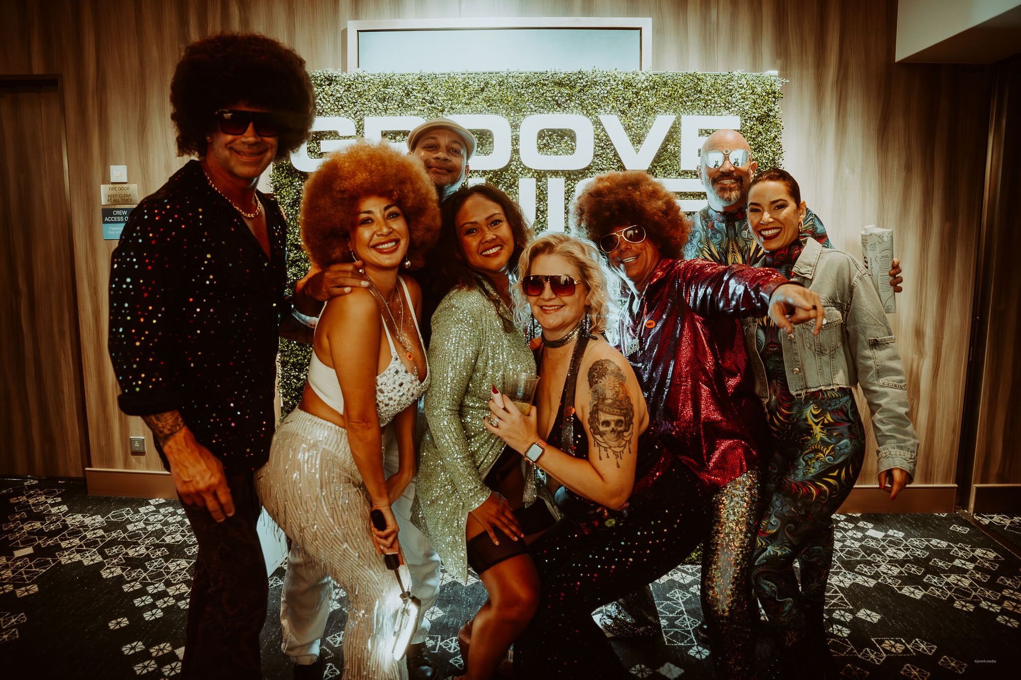 Friends in rave theme party outifts at Groove Cruise Miami 2024