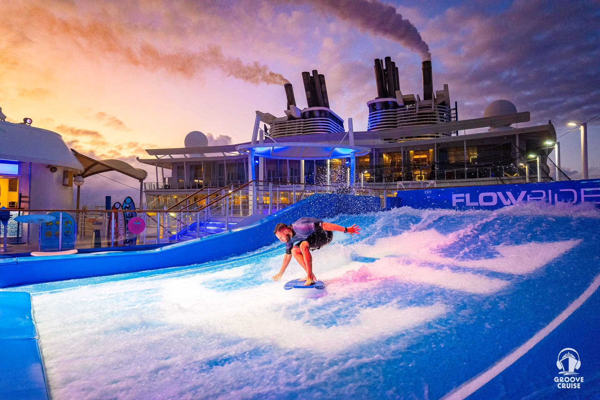 Captain enjoying FlowRider surf simulator on Wonder of the Seas pool deck at sunset