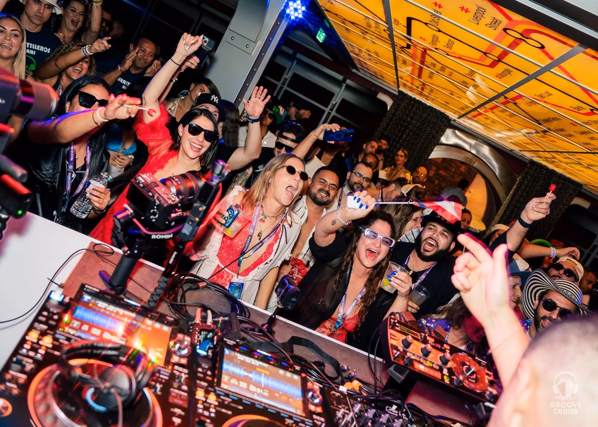 Festival attendees dancing to drum & bass in The Trench on Groove Cruise