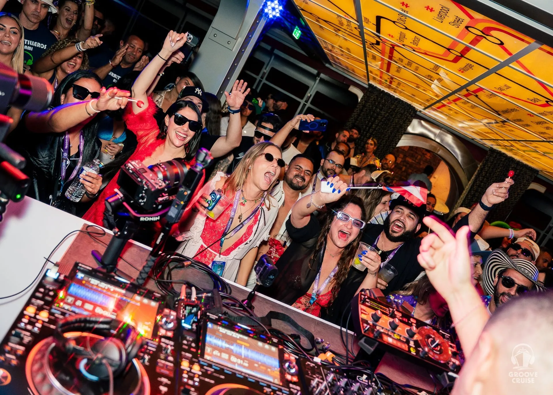 Festival attendees dancing to drum & bass in The Trench on Groove Cruise