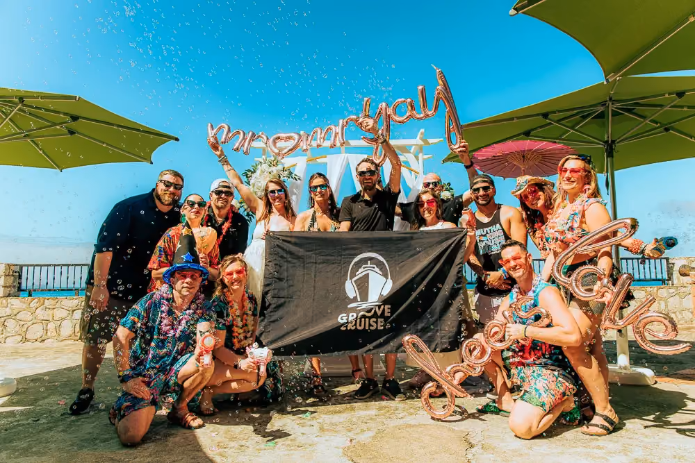 Groove Cruise couple celebrating their wedding with friends