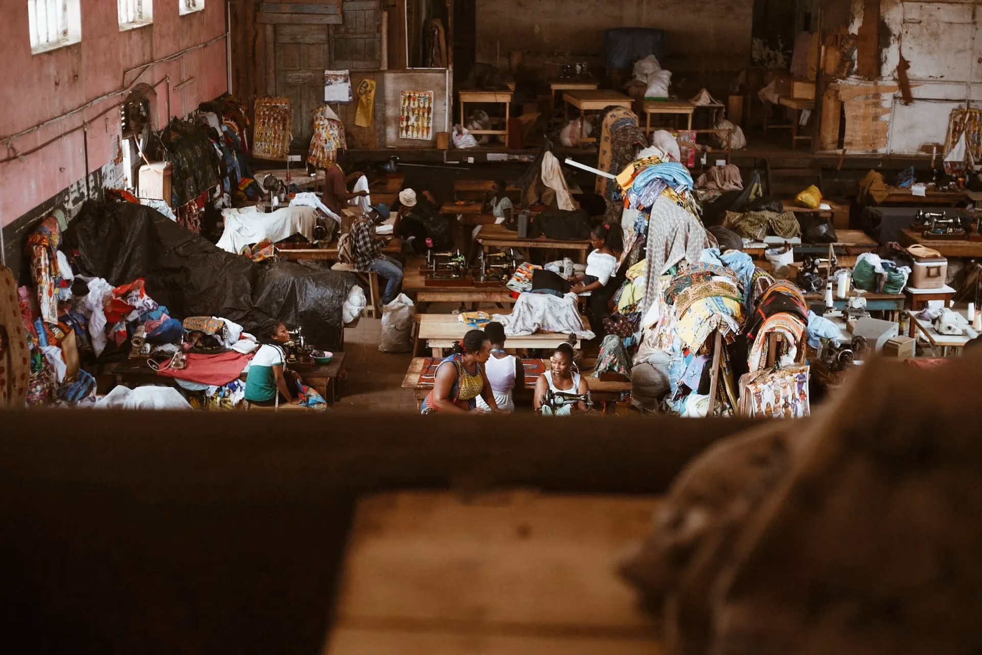 Old cinema in Obuasi, now used by fashion designers for fast-fashion clothing.
