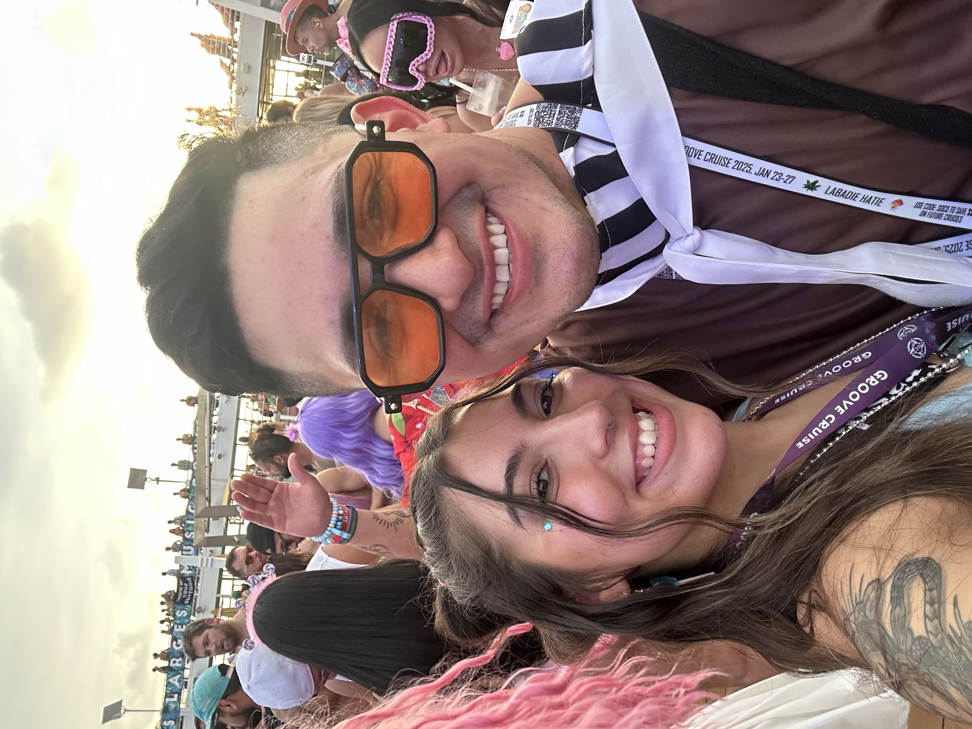 Bree and Juan taking a photo together on Groove Cruise Miami.