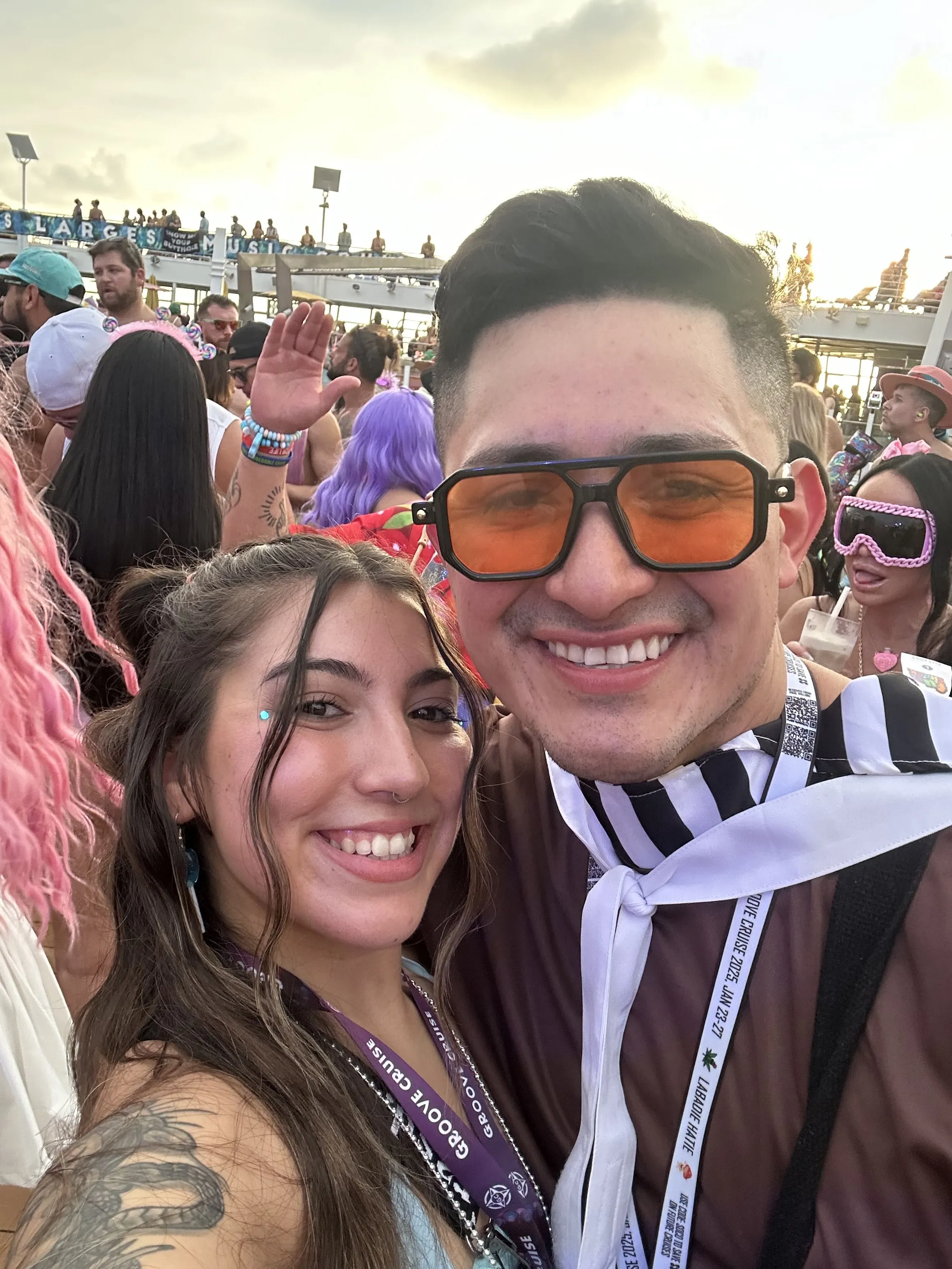 Bree and Juan taking a photo together on Groove Cruise Miami.