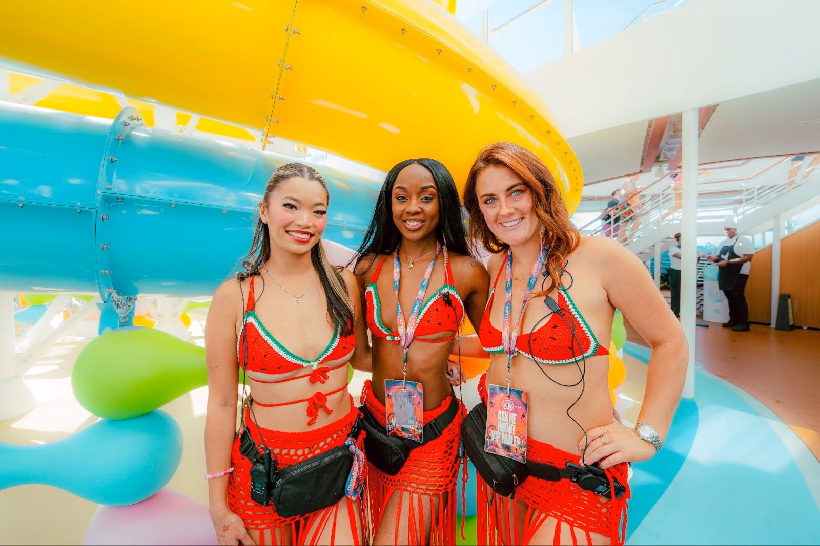 Three girl Captains in matching outfits pose together on Groove Cruise 2026.