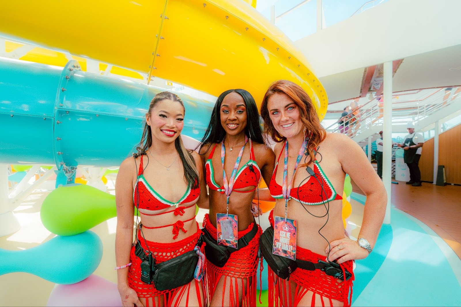 Three girl Captains in matching outfits pose together on Groove Cruise 2026.