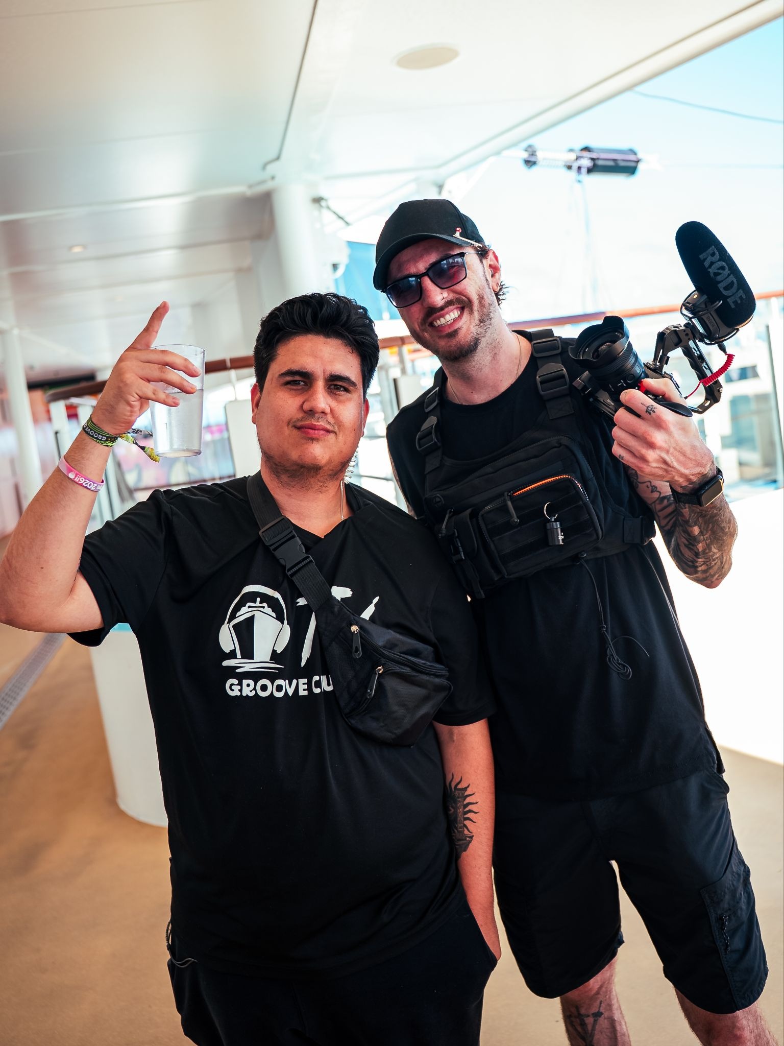 Two photographers on Groove Cruise 2026. 